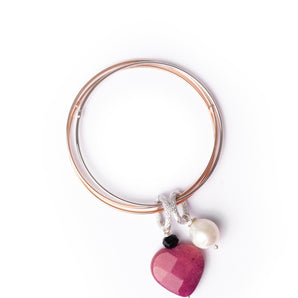 Rigid bracelet with white pearl and heart detail