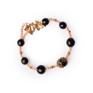 Bracelet with Black Onyx Gems and Vine Leaf Clasp